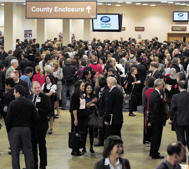 Crowds attending an exhibition.